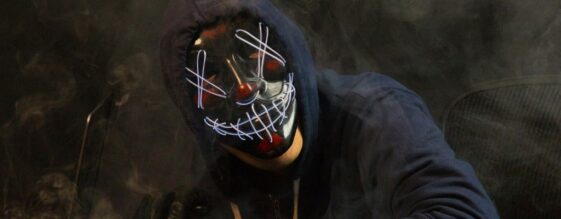 October is Cybersecurity Month Hacker in a mask